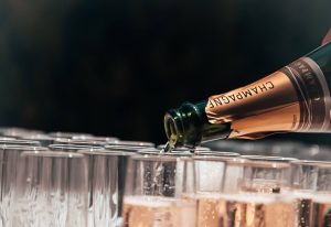 glasses being filled with sparkling wine