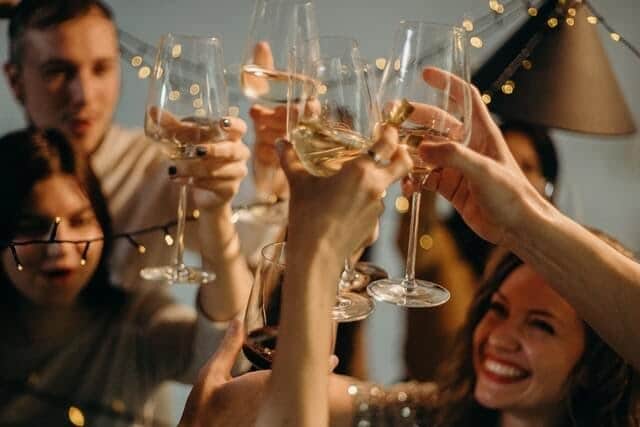 An image of a group of friends enjoying glasses of Canadian wine